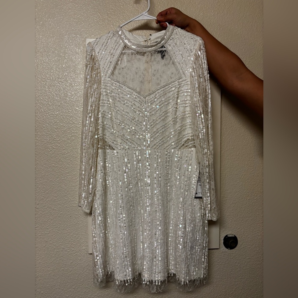 Adrianna Papell white beaded illusion dress.